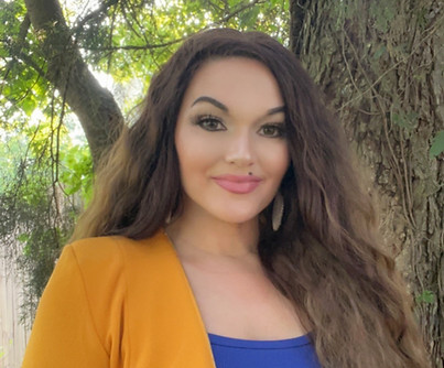 Ashley Moses New Headshot.jpg