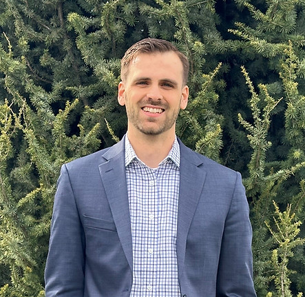 Nick Hill Nea Headshot (green).jpg